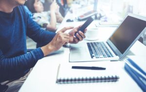 Man using multiple devices